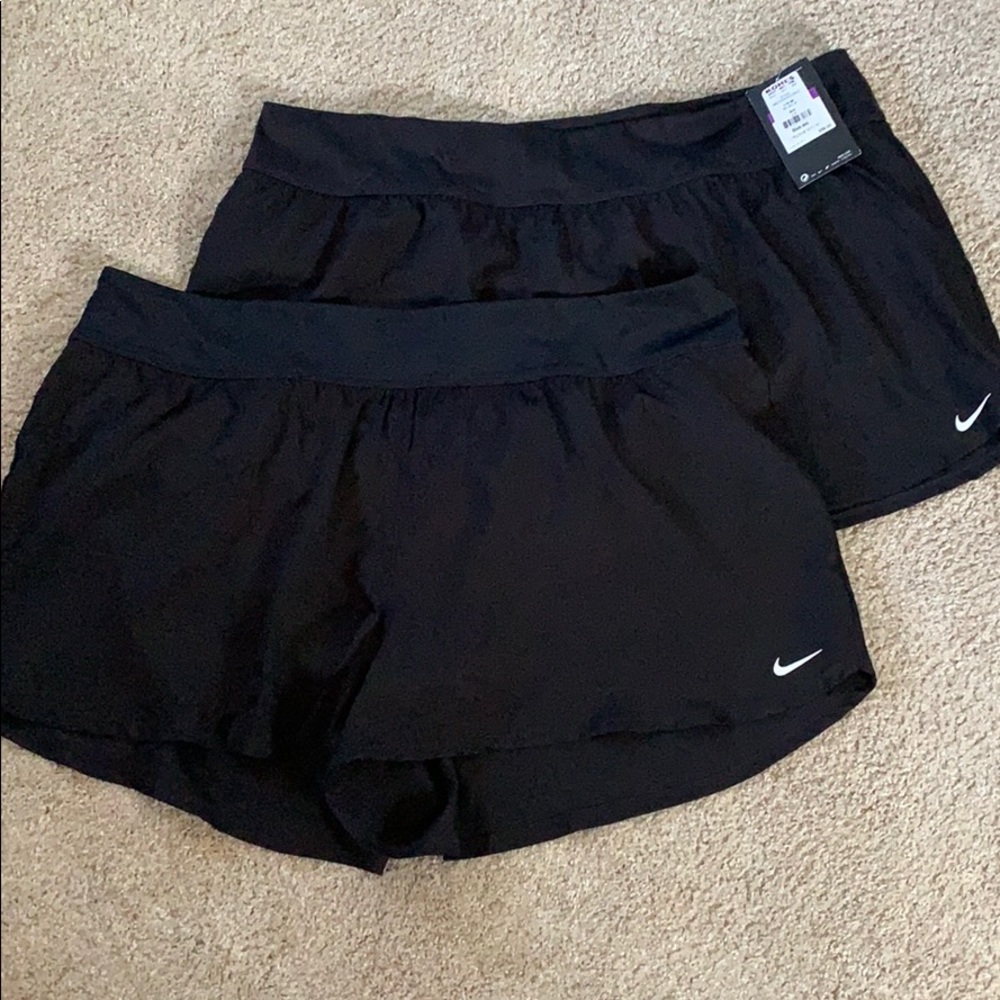 Nike Swim Shorts size 2X. Great condition. Listing is for 2 pair.